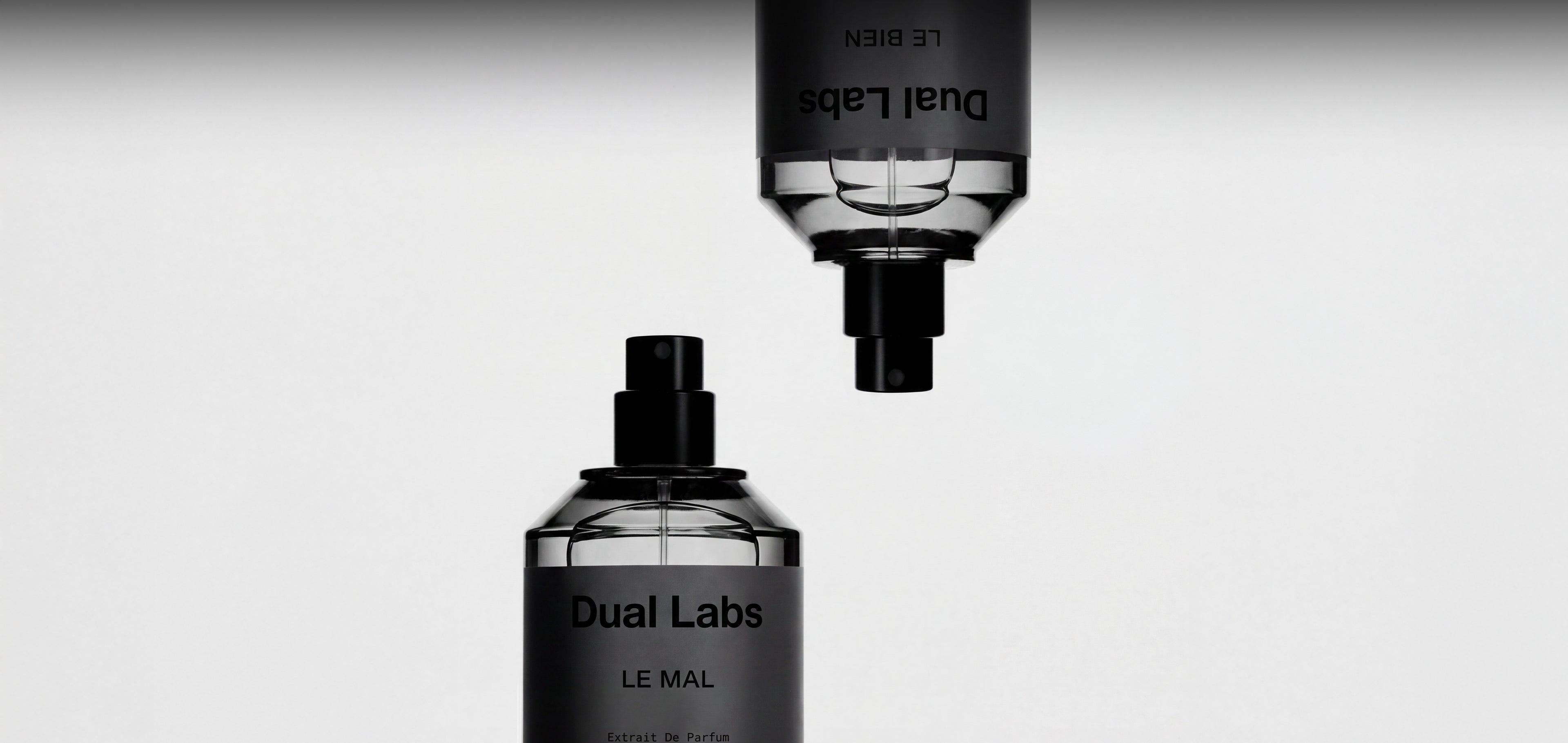 Dual Labs niche fragrance bottles Le Bien and Le Mal exploring scent contrast